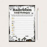 A Halloween-themed emoji pictionary worksheet with black spiderwebs, bats, pumpkins, and tombstones on a white page, shown next to a white pencil on a light beige background.