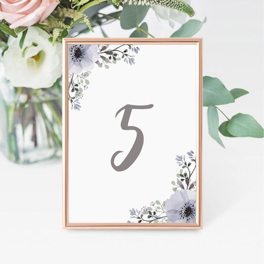 Purple floral table decorations by LittleSizzle