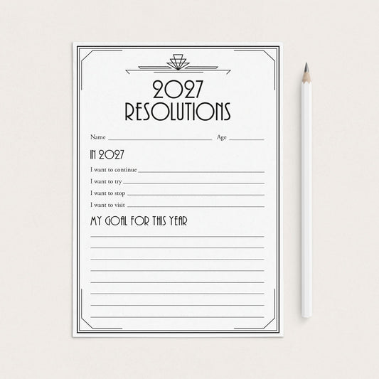 A black and white 2027 resolutions planner pad with lined writing space, shown on a light beige background next to a white pencil.