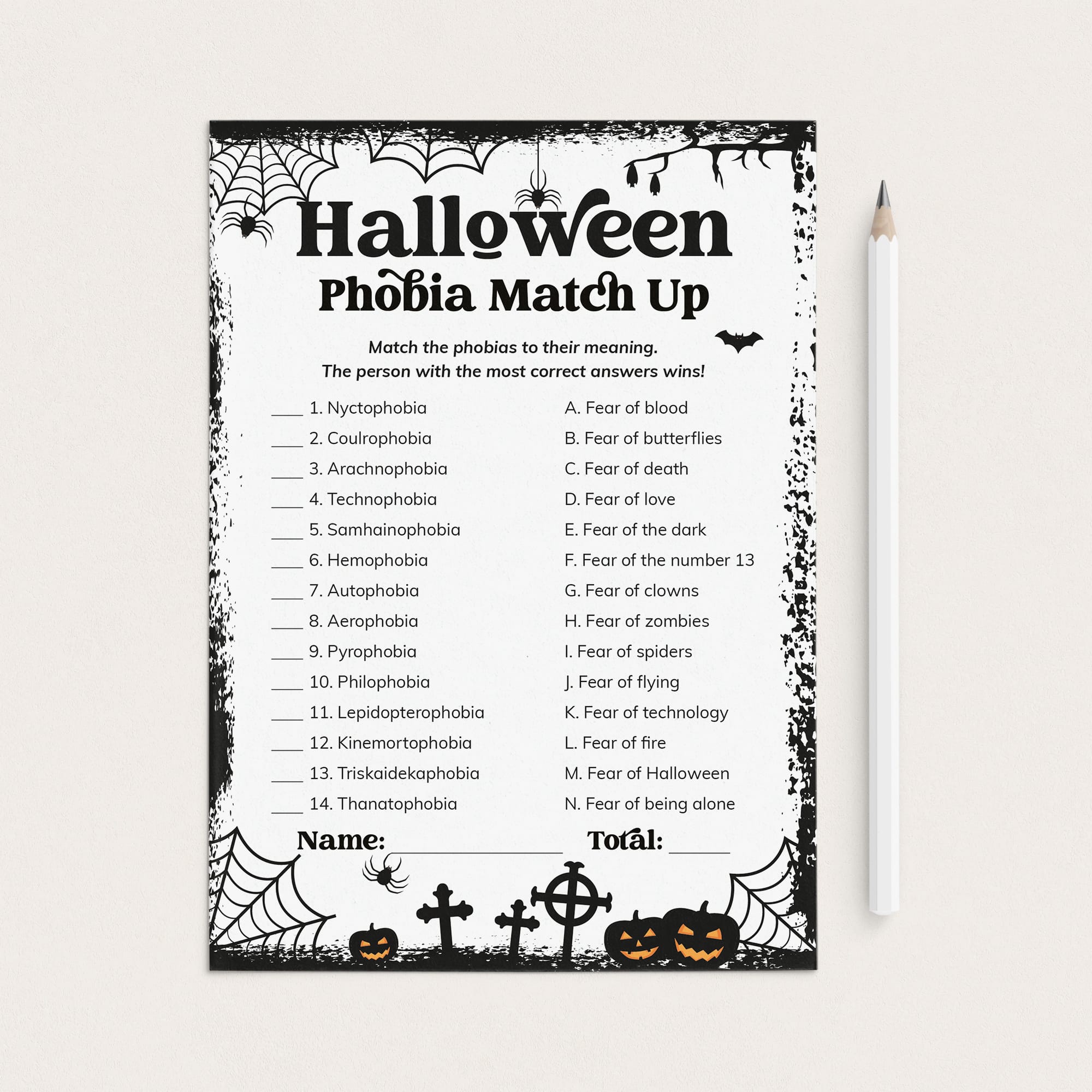 A printable Halloween-themed worksheet titled 'Halloween Phobia Match Up' with black text and spooky border graphics on a white sheet, shown on a light beige background with a white pencil beside it.