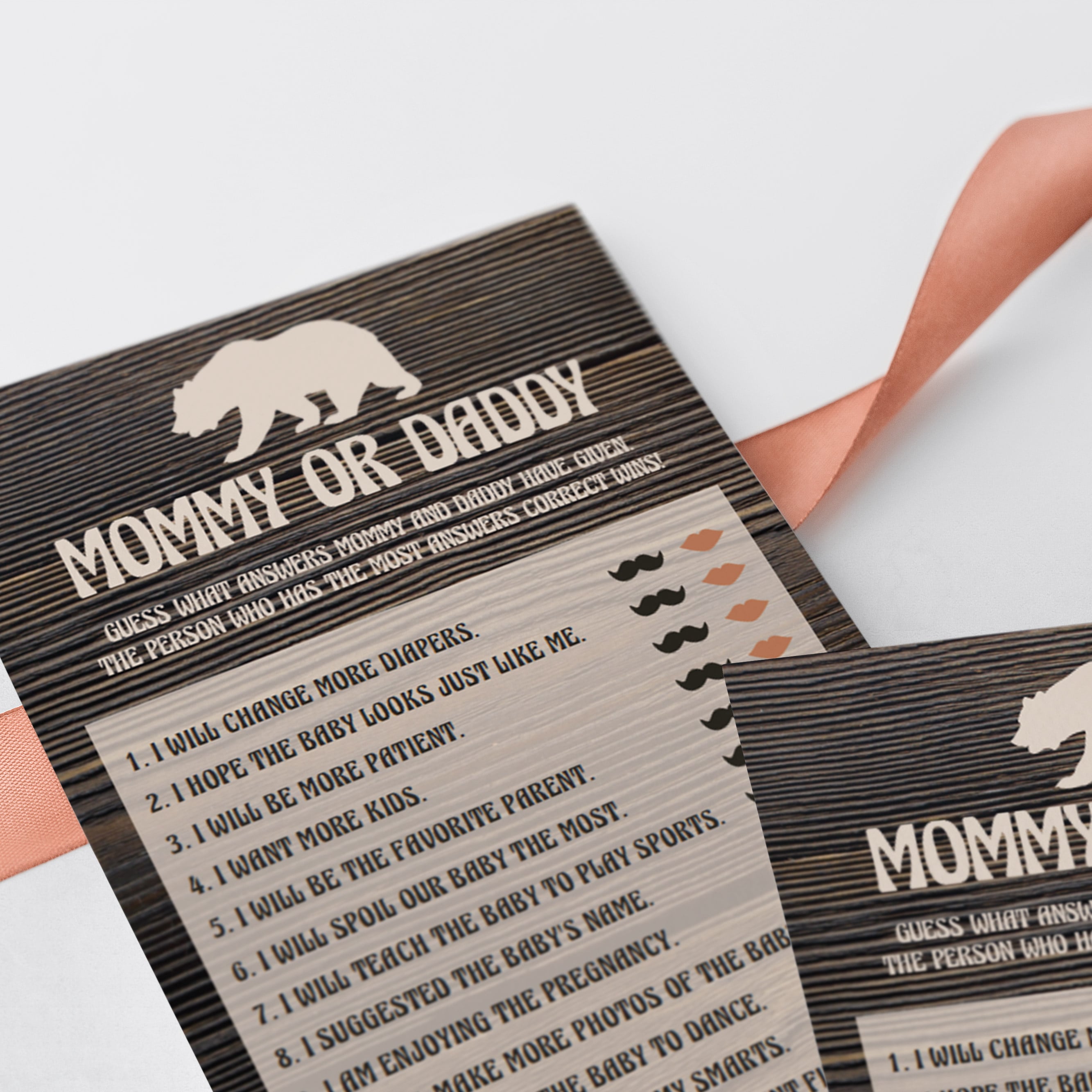 Co-ed baby shower game mommy or daddy quiz printable by LittleSizzle
