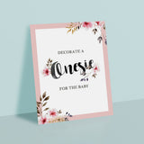 Onesie station table sign for girl baby shower pink floral by LittleSizzle